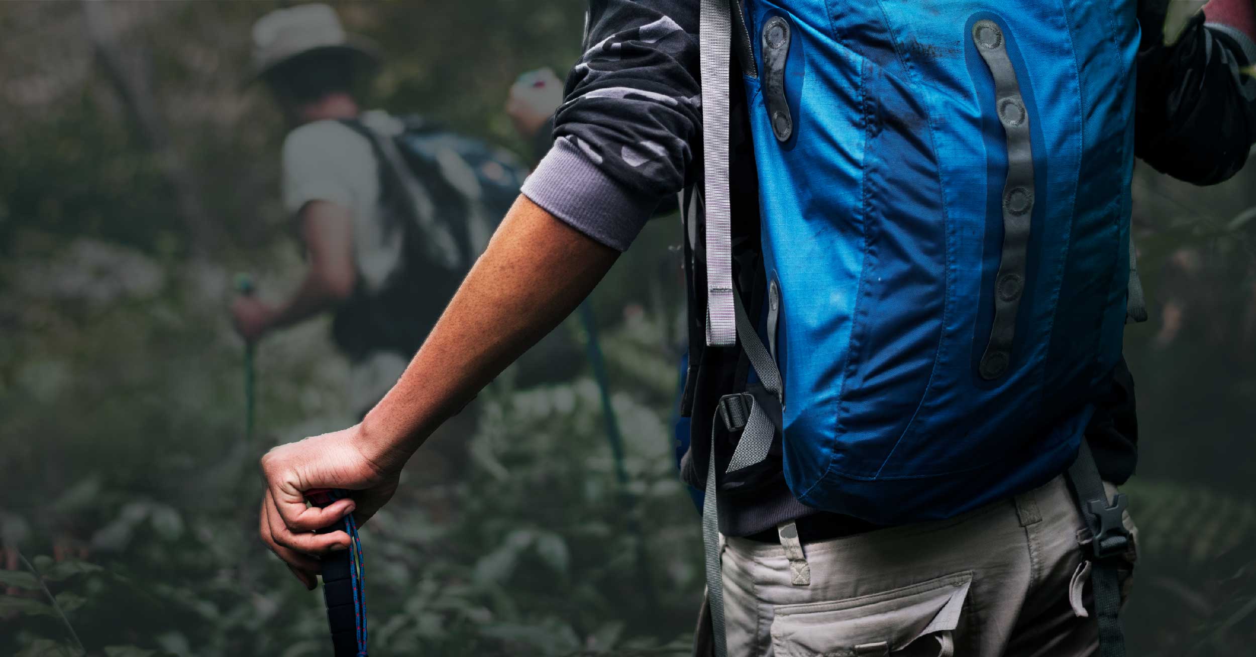 Person hiking with blue pack